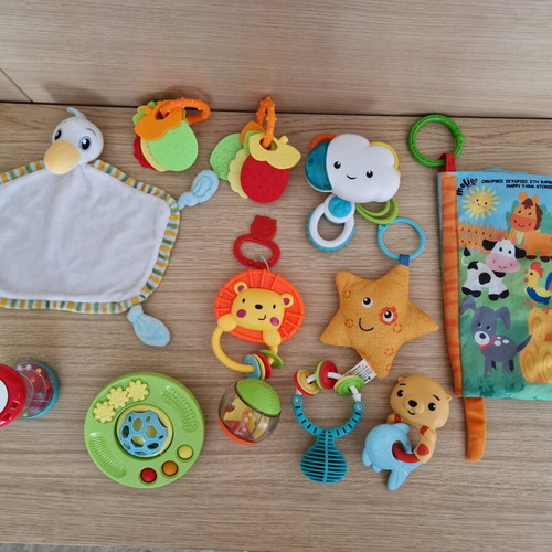 Baby toys like rattles, teethers and soft activity books, like new