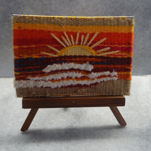 Woven sun used on wooden tripod