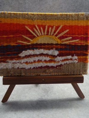 Woven sun used on wooden tripod