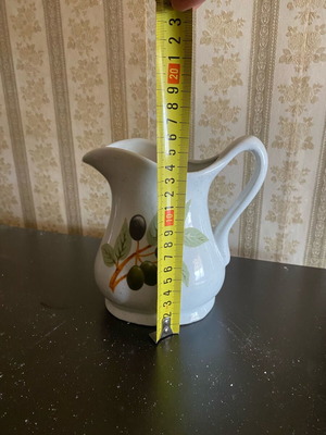 Pitcher used with designs