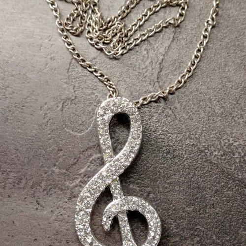 Pendant necklace with treble clef and rhinestones like new