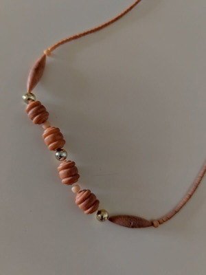 Boho necklace like new in earthy tones with decorative beads