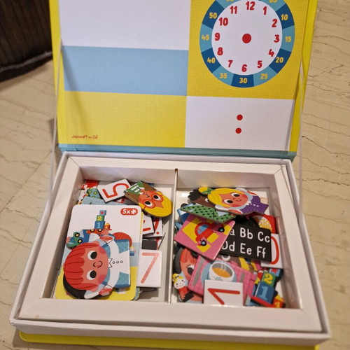 Magnetic toy used with daily routines and time learning