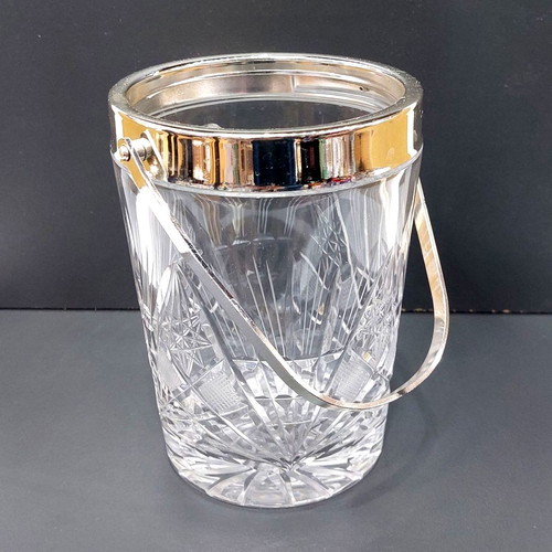 Glass ice bucket used with metal handle