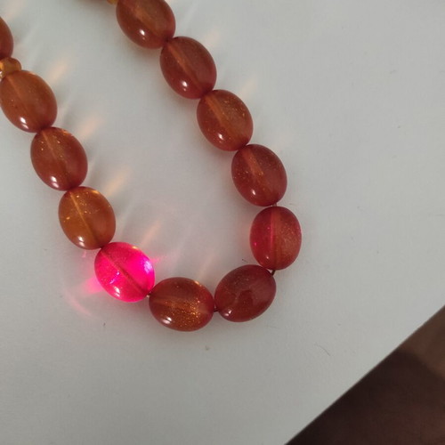 Mastic komboloi with orange shades, 33 beads