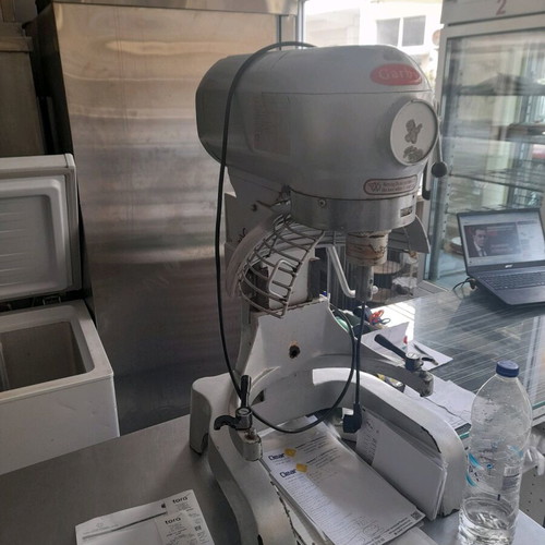 Pastry mixer used with bowl, wire, hook, and whisk attachments