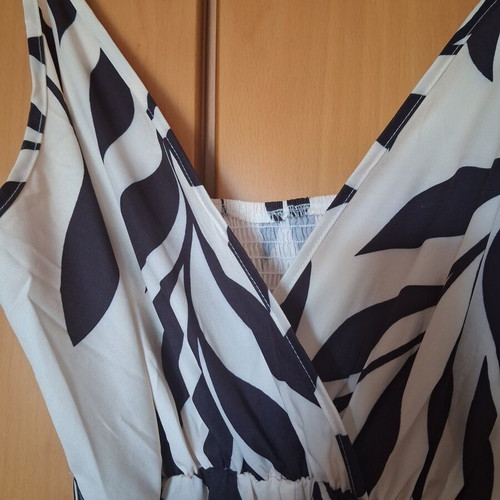 Jumpsuit new, white with large black leaf pattern, adjustable straps