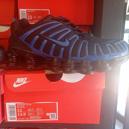 Nike Shox athletic shoes new, black and gold
