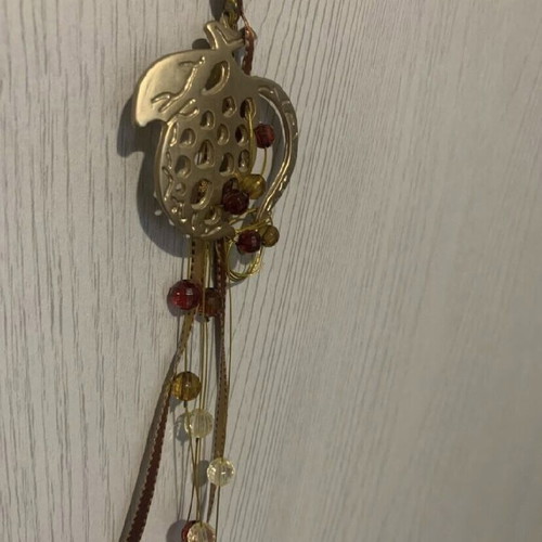 Hanging pomegranate charm new with gold and red ribbon