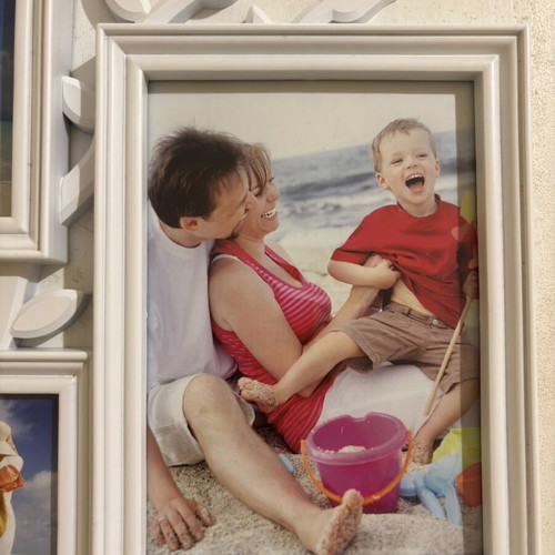 Plastic photo frame Family with 6 openings, like new