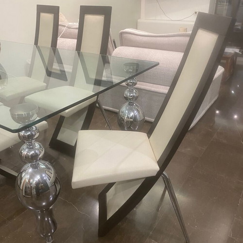 Glass dining table with 6 used Italian leather chairs, inox legs
