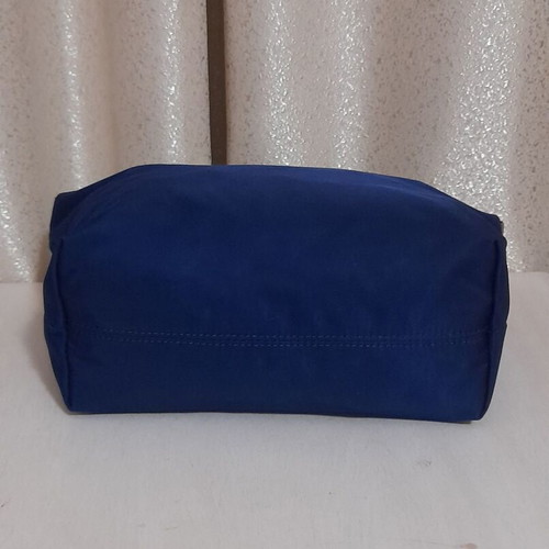Axel toiletry bag navy blue with brown details