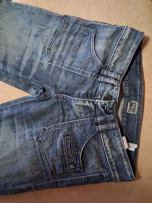 Jeans size 38 like new, blue with frayed details