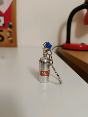 NOS bottle keychain new silver nickel