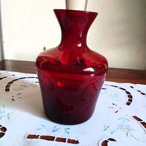 Red bottle like new with semi-crystal stopper