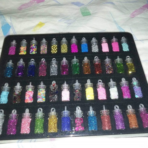 Set of 48 Glitter and Nail Art Flakes in Glass Bottles with Metal Case