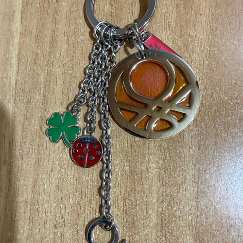 United Colors of Benetton silver keychain like new