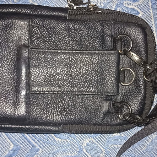 Konoitian crossbody bag like new, black leather texture