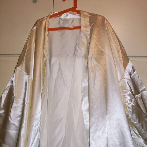 2 women's robes like new, one cream and one black with flower detail