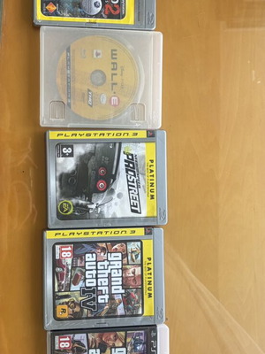 PlayStation 3 games used including Uncharted 2, GTA IV, GTA V, Wall-E