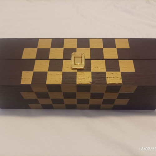 Wooden wine case used with travel chess set