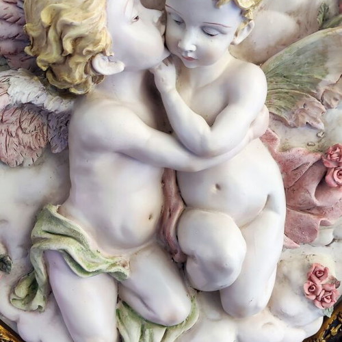 Relief wall art used in ornate frame 56x50cm