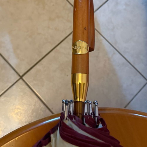 Susina umbrella like new with wooden handle and gold details