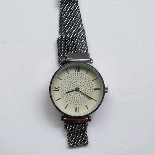 Metal watch silver with Latin dial 30mm and magnetic bracelet like new