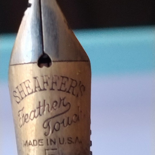 Sheaffer's vintage fountain pen set with 14K gold nibs and desk base, used
