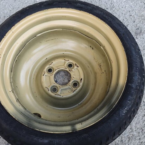 Tire saver T115/70D14 88M used, steel rim beige/yellow
