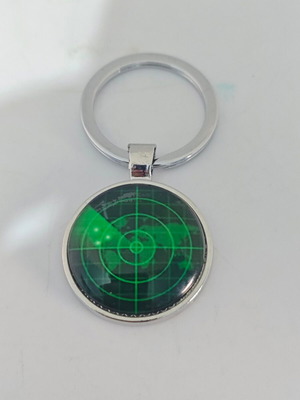 Metal keychain like new with green radar screen design