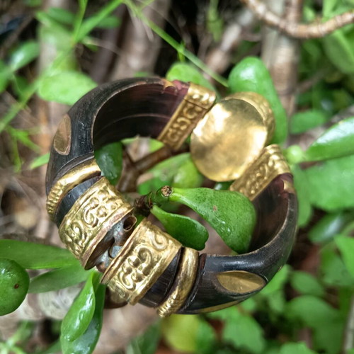 Wooden Boho bracelet used with bronze details and semi-precious stone
