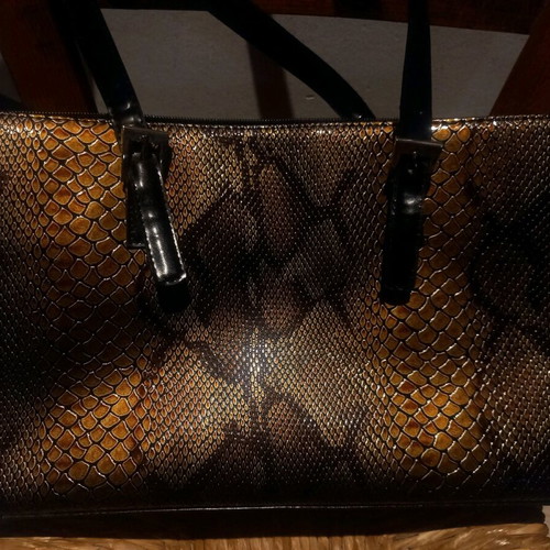 Shoulder bag like new with snake pattern
