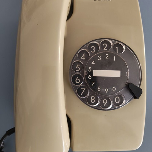 Siemens vintage telephone with rotary dial used