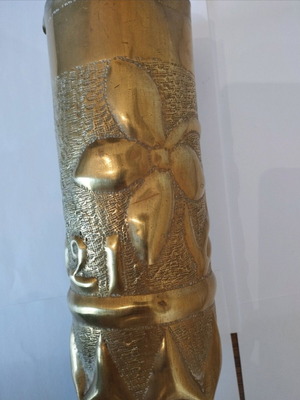 Bronze carved shell casing like new