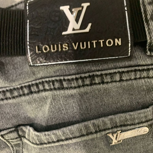 Louis Vuitton women's jeans new with belt and inner wallet grey