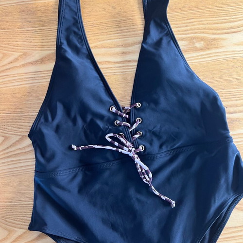 Black one-piece swimsuit with animal print cord, size L, like new