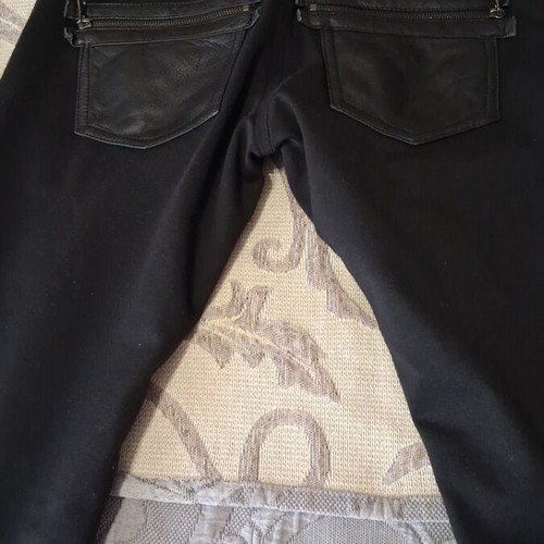 Leather pants used with elastic fabric back