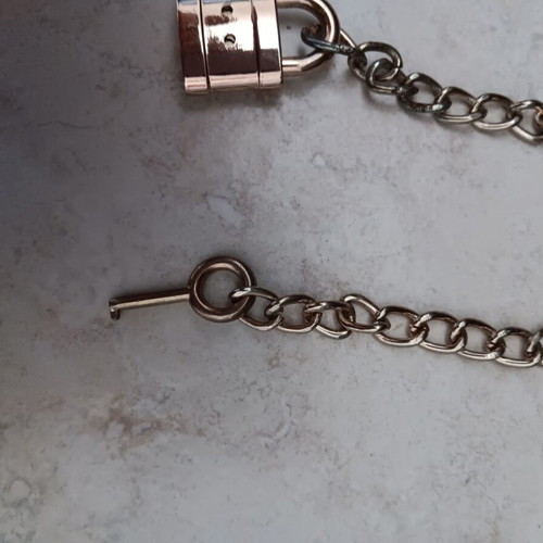 Small padlock with key used, in good condition