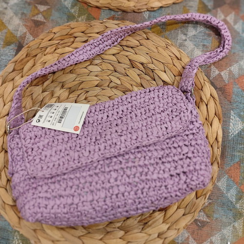Purple straw shoulder bag