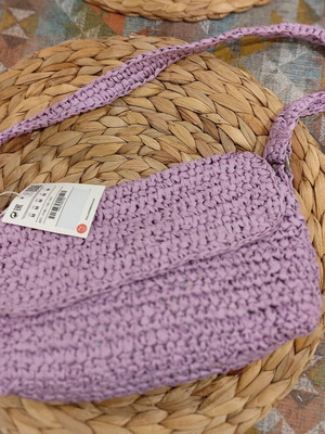 Purple straw shoulder bag
