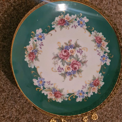 Porcelain platter like new with gold details and intense green color
