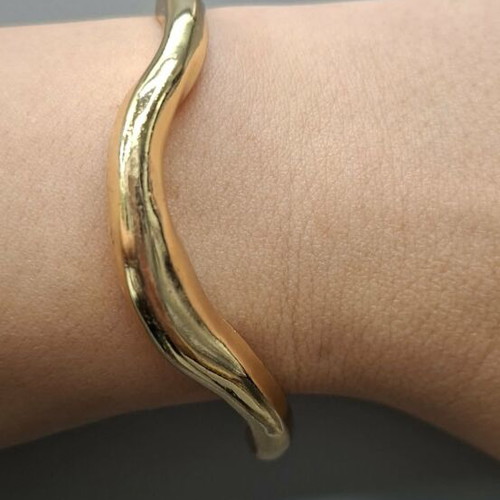 Gold-tone metal cuff bracelet, minimal design
