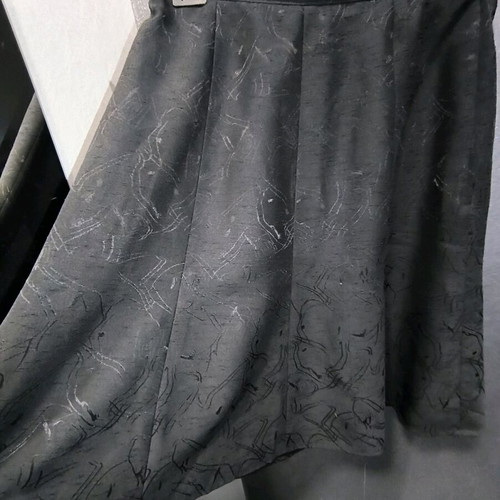 Vintage customized skirt with textured fabric and abstract print, like new