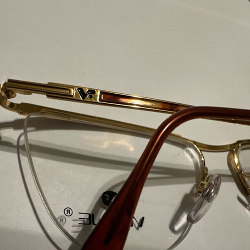 Oval Vogue optical glasses with tortoise details and gold frame, new