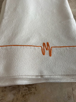 Sofa cover like new, white cream with orange details