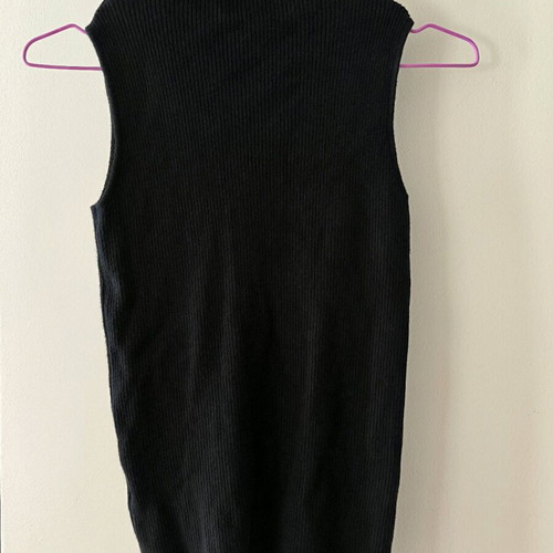 Women's sleeveless blouse black like new with small turtleneck