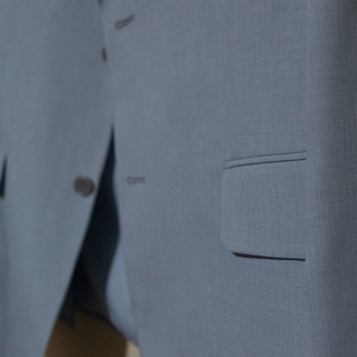 Suit gray and light blue like new, pants size 46 jacket 52