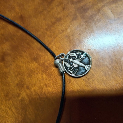 Scorpio necklace used, black and silver