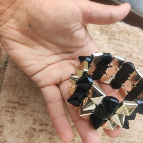 Punk style bracelet used, elastic, gold and black